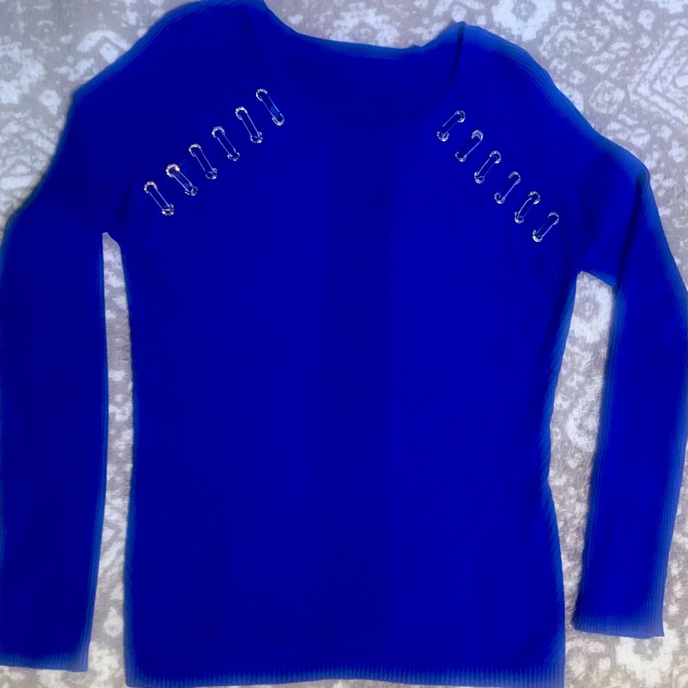 Beautiful cobalt blue sweater with satin ribbon accents.
